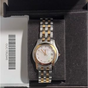 Gucci two tone, mother of pearl face women’s watch with box and extra links